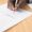 person writing on white paper